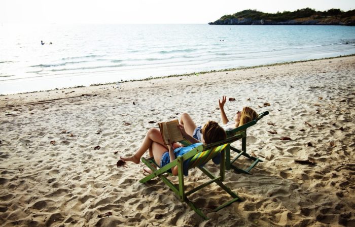 reading books on a beach